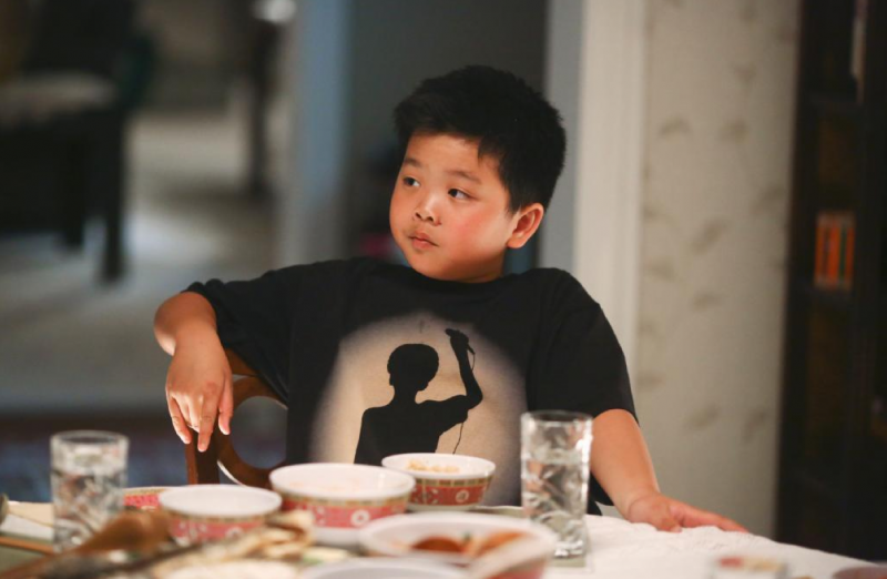 Hudson Yang as young Eddie Huang. (@FreshOffABC/Twitter)