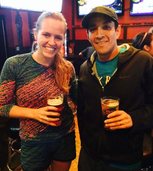 Gillian Clow and Andres Cruz enjoy post-run beer and tacos at Big Wangs. (Danica Ceballos/Neon Tommy)