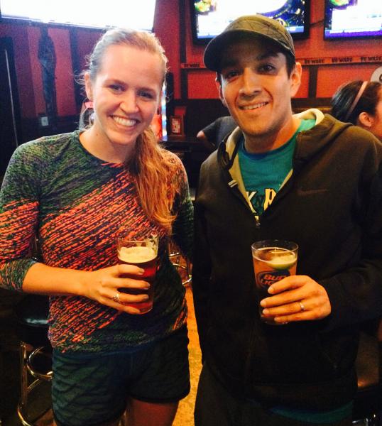 Gillian Clow and Andres Cruz enjoy post-run beer and tacos at Big Wangs. (Danica Ceballos/Neon Tommy) Gillian Clow and Andres Cruz enjoy post-run beer and tacos at Big Wangs. (Danica Ceballos/Neon Tommy)