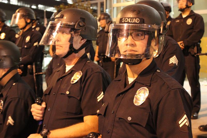 Police stand ready outside the LAPD headquarters. (Rebecca Gibian/Neon Tommy)