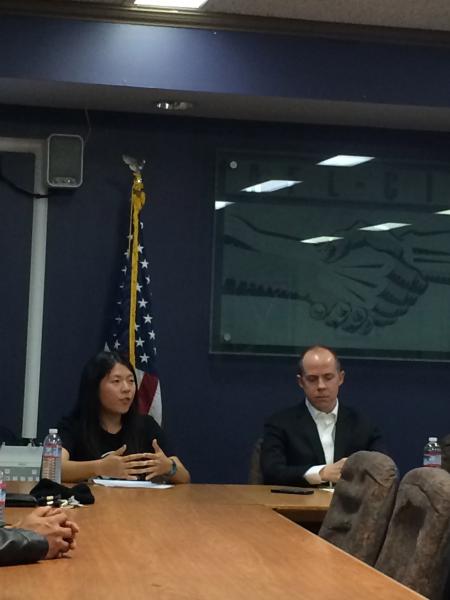 Tina Tran tells her story of working in less than stellar restaurant conditions, while Rusty Hicks looks on. (Sean Burch/Neon Tommy)