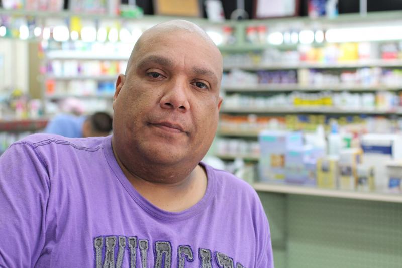 George Sanchez clerks at St. Louis Drug Company, a 75-year-old, family-owned pharmacy. (Taylor Haney/Neon Tommy)