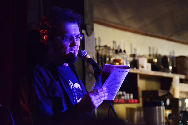 Lee Keeler reads at Republic of Pie in NoHo during Lit Crawl. (Hillary Jackson/Neon Tommy)