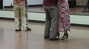 Some residents participated in the center's weekly dance in the cafeteria (Hillary Jackson/Neon Tommy)