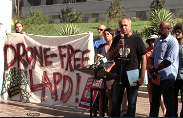 Stop LAPD Spying Coalition organizer Hamid Khan speaks at Monday's press conference. (Maritza Moulite/Neon Tommy)