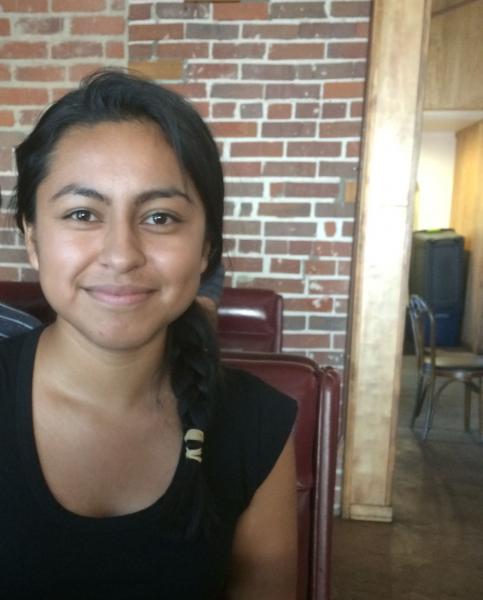 Restaurant manager Karina Lopez says tax exemptions may change her mind on the minimum wage increase. (Raakhee Natha)