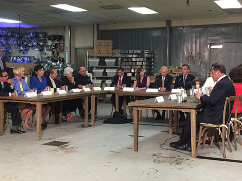 Joe Biden, Mayor Garcetti and business leaders discussing a local wage increase. (Raakhee Natha/Neon Tommy)