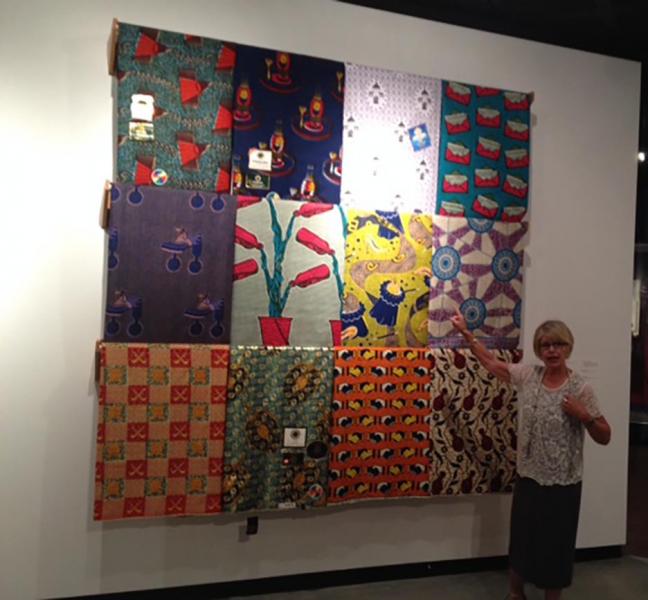 Betsy Quick explains the history of printed Ghanaian fabrics at the Fowler Museum (Vanessa Okoth-Obbo/Neon Tommy)