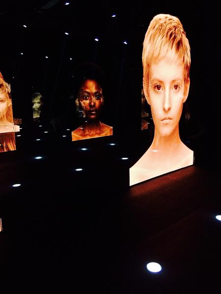 The "Talking Faces" exhibit features the floating heads of models from the runway show (Cassidy Waters)