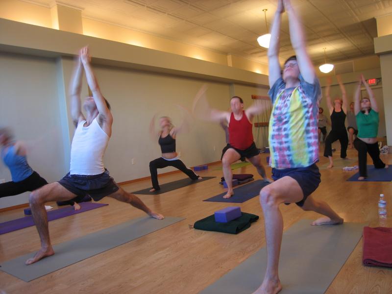 Yoga class. Photo taken by Evan Lovely (Creative Commons).