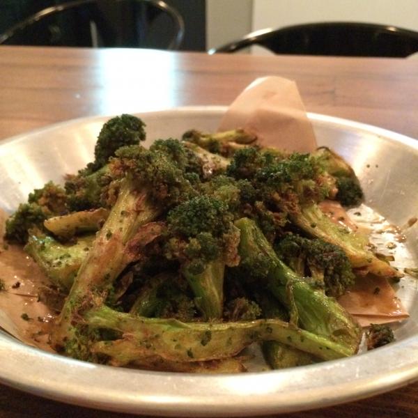 A top seller, Fire Broccoli is fried and drizzled with sherry vinegar, soy and red chili flakes for a tangy bite packed in each nibble. (Marisa Zocco)