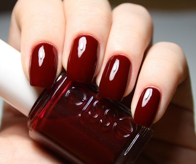 Rich, crimson nail polish (@Temptalia/Pinterest)