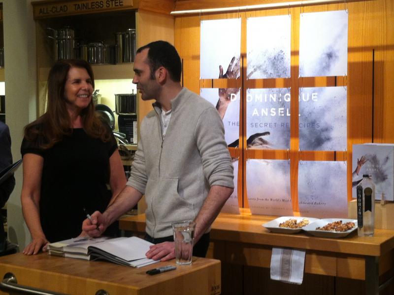 Dominique Ansel chatting with a fan during a book signing event at Williams-Sonoma. (Sara Tiano/Neon Tommy)