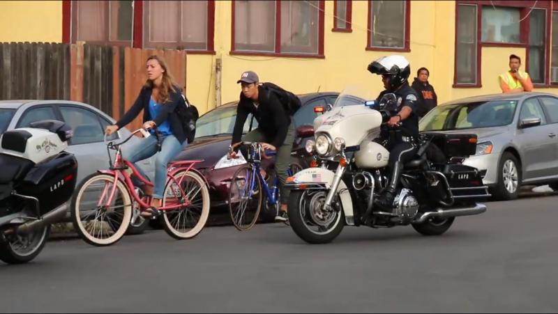 Bike cops ticketing students for unsafe cycling. (Giovanni Moujaes/Annenberg Media Center