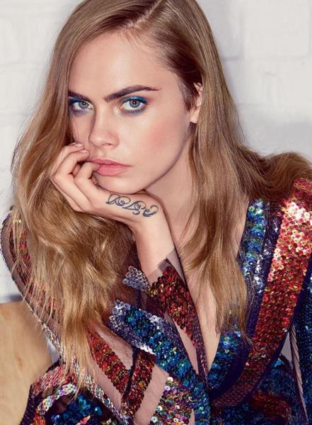 Cara Delevingne was named "Model of the Year" at the 2012 and 2014 British Fashion Awards (@ENews/ Twitter)