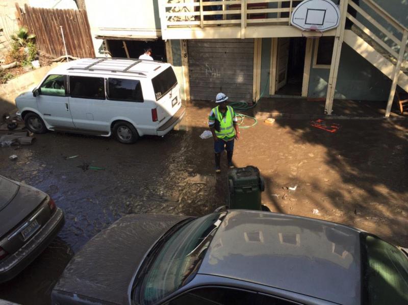 A water main break on Franklin St. floods an apartment complex Wednesday, Feb. 18, 2015, in Los Angeles, California. Despite the recent increase in pipe leaks, voters and many city politicians have not made infrastructure a top priority. (Neon Tommy/Madisen Keavy).