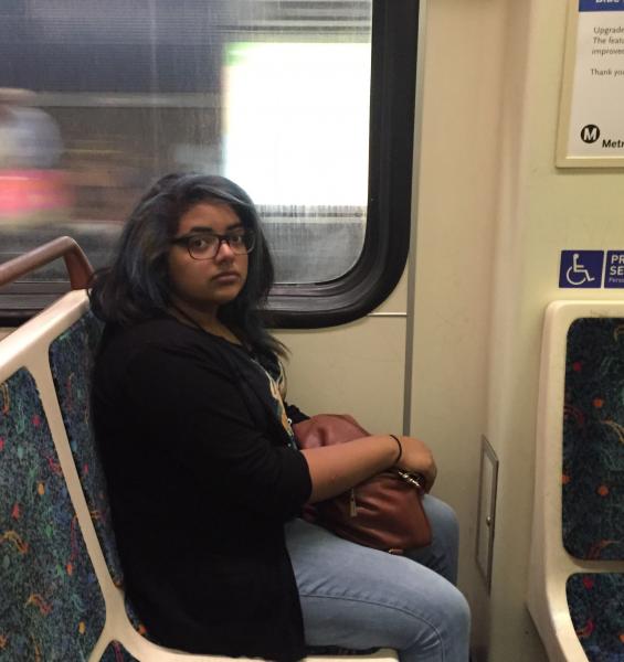 Amy Black riding the Red Line Metro to UCLA. (Rasha Ali / Neon Tommy)