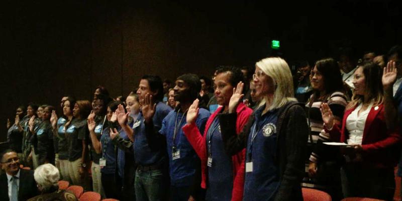 AmeriCorps volunteers as they take their oath. (Ariba Alvi/Neon Tommy)