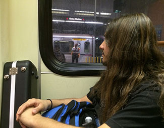 Juan Carlos De Alba waits for the Red Line to leave Union Station. (Brian Bencomo) Juan Carlos De Alba waits for the Red Line to leave Union Station. (Brian Bencomo)