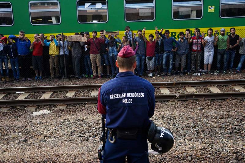 Syrian refugees strike at a platform in Budapest in September. At least half of U.S. governors are refusing to take in Syrian refugees following the attacks on Paris. (Mstyslav Chernov, Creative Commons)