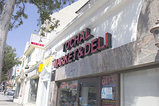 Tochal Market and Deli sits on Westwood Boulevard near the Persian Square. The shop's owner, Todd Khovavavi, looks forward to adding more products when trade sanctions against Iran are lifted. (Helen Floersh/Annenberg Media)