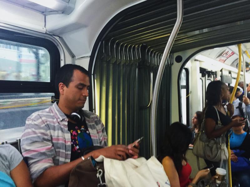 Commuter Benjamin Deleon on Metro's 720 bus line. (Mengchen Liu/ Annenberg Media)