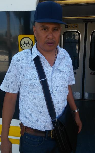 Abel Pelayo prepares to board the Metro Rail (Lamarco McClendon)
