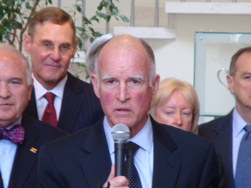 Gov. Jerry Brown standing in front of L.A. business leaders earlier this year.