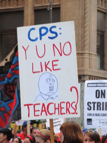 Chicago Public Schools, or CPS, is in a contract dispute with the Chicago Teachers Union, or CTU. A protestor held this sign on Monday. (Zol87/Flickr)
