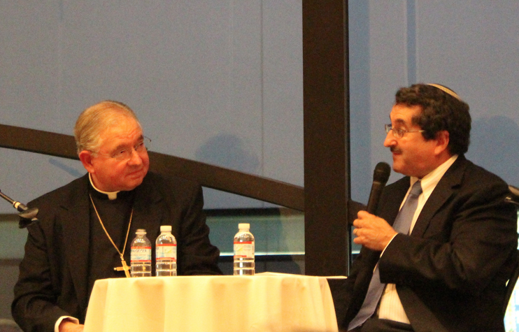 Archbishop Jose Gomez and Rabbi Mark Diamond converse during an event at Mt. Sinai Temple on May 1. (Paresh Dave/Neon Tommy)