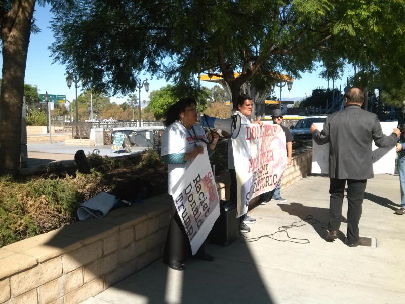 The Full Rights for Immigrants Coalition speak outside of NBC Universal.