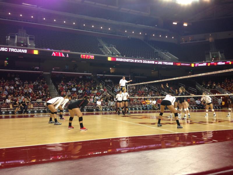 The Women of Troy wait for the serve on the court. (Jen Mac Ramos / Annenberg Media)