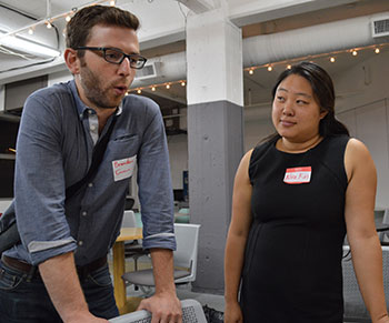 Brandon Gruzen and Lisa Kim discuss plans for matching homeless people with affordable housing. (Chole Marie Rivera/Neon Tommy)