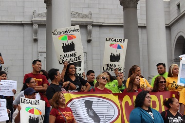 Street vendors and allies gathered for a press conference at City Hall before the committee meeting (Kevin Walker/ Annenberg Media)