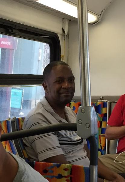 Cooper rides the Rapid 720 line back to the Wilshire-Vermont Metro station. (Kevin Walker/Annenberg Media