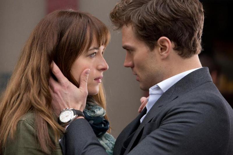 Dakota Johnson and Jamie Dornan in "Fifty Shades of Grey"/Universal Pictures (Focus Features).