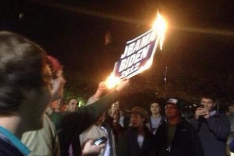 An Obama/Biden sign was burned at the anti-Obama rally at the University of Mississippi (Twitter)