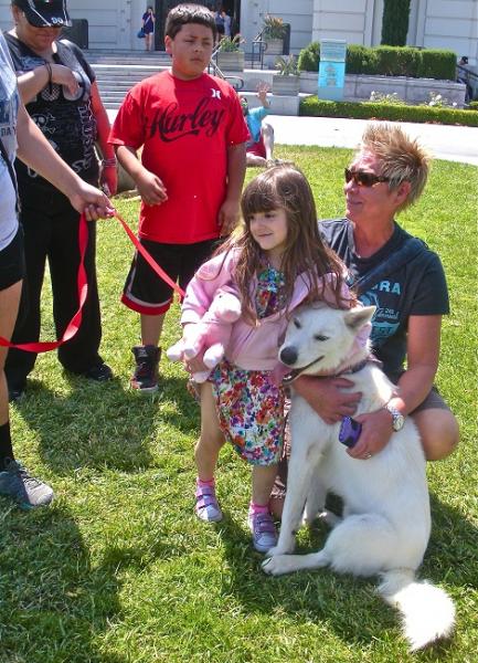 Happy ending -- Cougar found Lily (girl on the left) and her family on the hike to Griffith. They adopted him that same day. Happy ending -- Cougar found Lily (girl on the left) and her family on the hike to Griffith. They adopted him that same day.