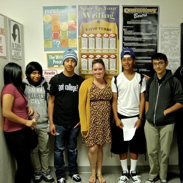 Lindsay and her students smile at the camera as the school day comes to an end.