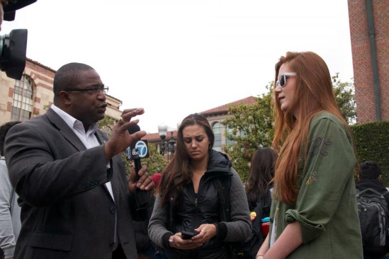 ABC 7 interviews two students who attended the party. (Faith Jessie/ Neon Tommy) ABC 7 interviews two students who attended the party. (Faith Jessie/ Neon Tommy)