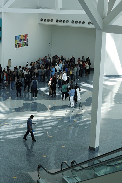 Hundreds line up inside the Convention Center on Tuesday for a chance to modify their mortgages. (Photo by Aaron Liu)