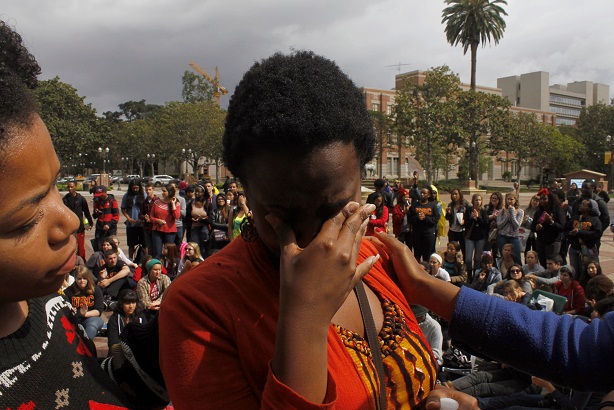 Makiah Green tears up during the rally. (Aaron Liu/ Neon Tommy)