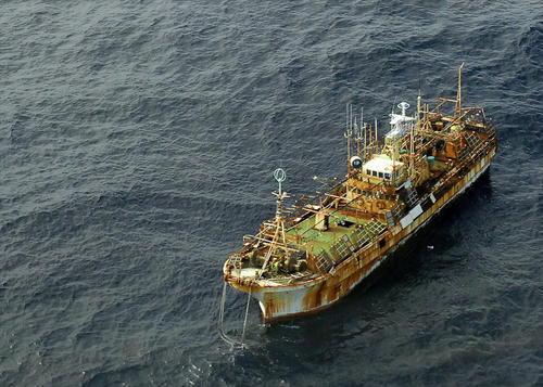 The boat had been unhinged from its port in Hokkaido, Japan, following the tsunami. (US Coast Guard)