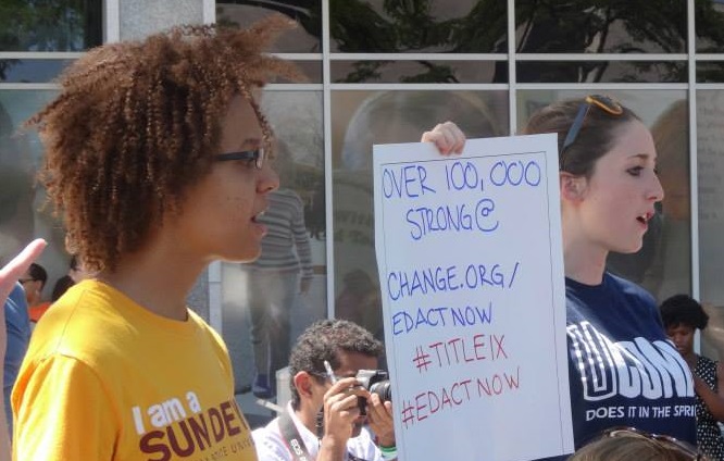 ASU alum Jasmine Lester (left) and UConn activist Carolyn Luby (right) speak at a rally in Washington D.C. to petition The Department of Education to take a stronger stance against sexual assault on college campuses. The rally inspired Lester and others at ASU to form "Sun Devils Against Sexual Assault," one of several student activists groups formed across the nation in recent years. (Photo by Katie Baumann)