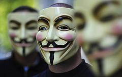 Anonymous' Guy Fawkes regalia. (Flickr Creative Commons)