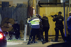 Boston cops seek out the bombing suspects. (Flickr Creative Commons)