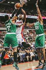 Jason Collins, right, defends a shot while playing for the Celtics. (Wikimedia Commons)