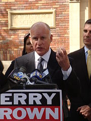 The governor at a press conference.  (Wikimedia Commons)