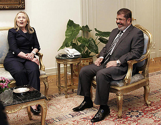 Morsi having a laugh with Secretary of State Hillary Clinton.  (Flickr Creative Commons)