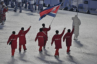 North Korea flag bearers at the Olympics. (Wikimedia Commons) North Korea flag bearers at the Olympics. (Wikimedia Commons)